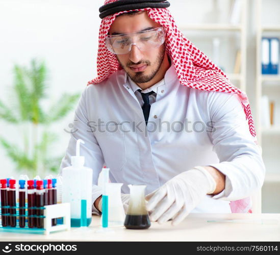 The arab chemist working in the lab office. Arab chemist working in the lab office