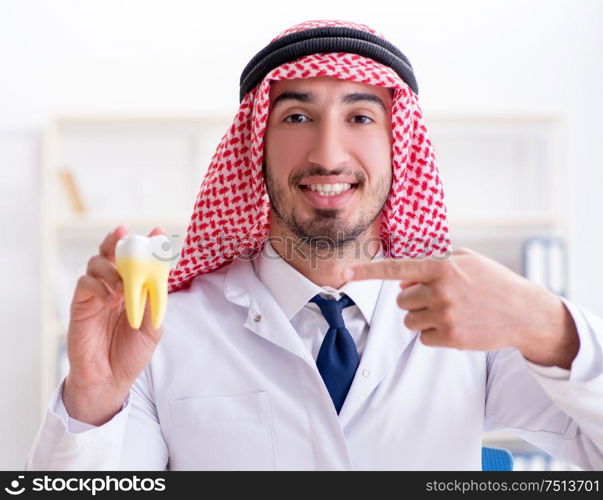 The arab dentist working on new teeth implant. Arab dentist working on new teeth implant