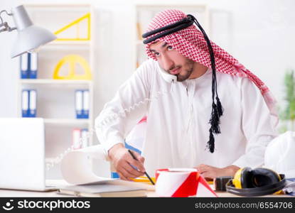 The arab engineer working on new project. Arab engineer working on new project