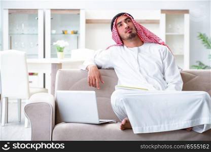 The arab man working at home on his work. Arab man working at home on his work