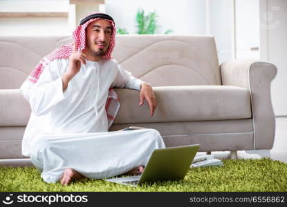 The arab man working at home on his work. Arab man working at home on his work