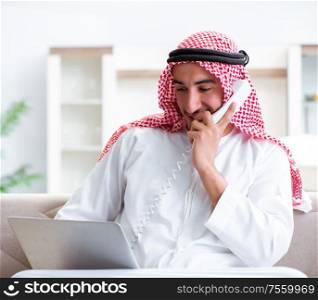 The arab man working at home on his work. Arab man working at home on his work