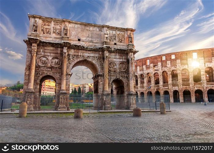 The Arch of Constantine and the Coliseum in Rome, Italy.