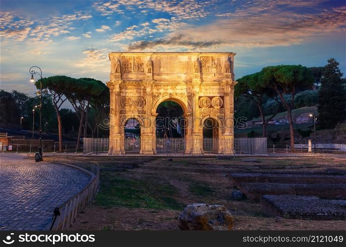 The Arch of Constantine by the Coliseum, night view, Rome, Italy.