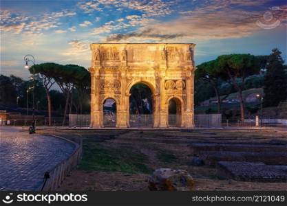 The Arch of Constantine by the Coliseum, night view, Rome, Italy.