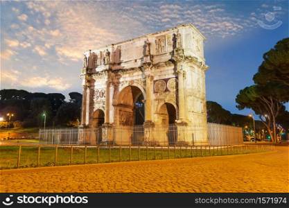 The Arch of Constantine in Rome, Italy, evening view.