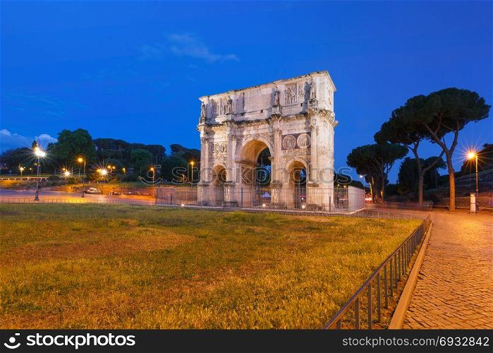 The Arch of Titus at night, Rome, Italy.. The Arch of Titus during blue hour, in the centre of the old city of Rome, Italy.