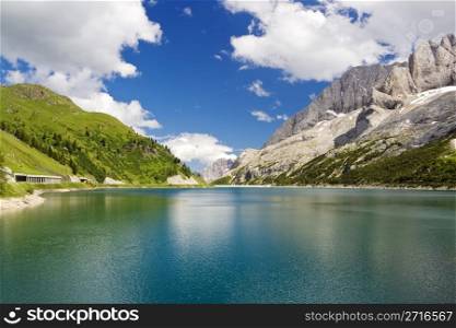 The artificial lake and pass of Fedaia (Dolomites, Trentino, Italy), at summer
