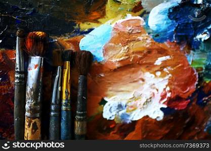 The artist paints a portrait of oil on canvas