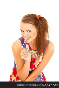 The attractive young girl plays with a chewing gum on a white background