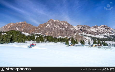 The Austrian Alps in winter - Winter scenery with the rocky peaks of the Austrian Alps mountains from the Ehrwald municipality and their forever green fir forests and wide pastures covered in snow.