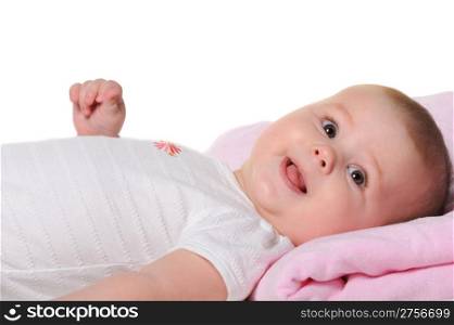 The baby lays. Age of 8 months. It is isolated on a white background