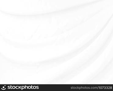 The background of a piece of white cloth material with wrinkles