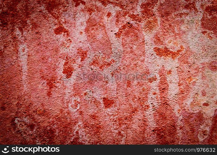 The background of grunge wall with peeling paint