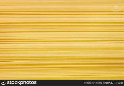 The background of the long raw wheat spaghetti