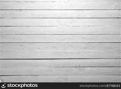 the background of weathered white painted wood