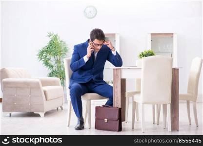 The bankrupt businessman angry and upset at home. Bankrupt businessman angry and upset at home. The bankrupt businessman angry and upset at home
