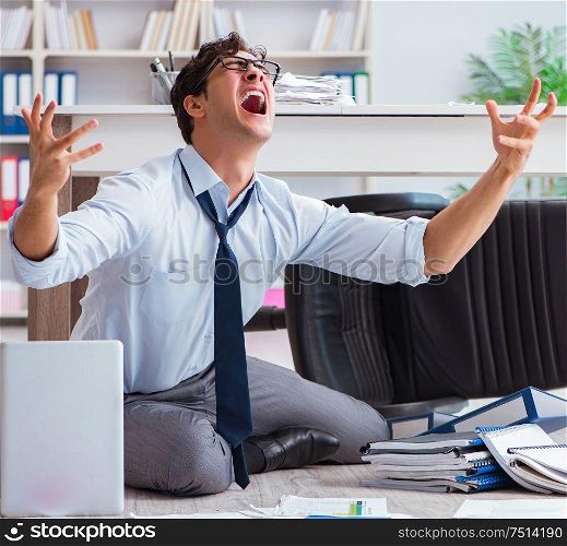 The bankrupt businessman angry in the office floor. Bankrupt businessman angry in the office floor