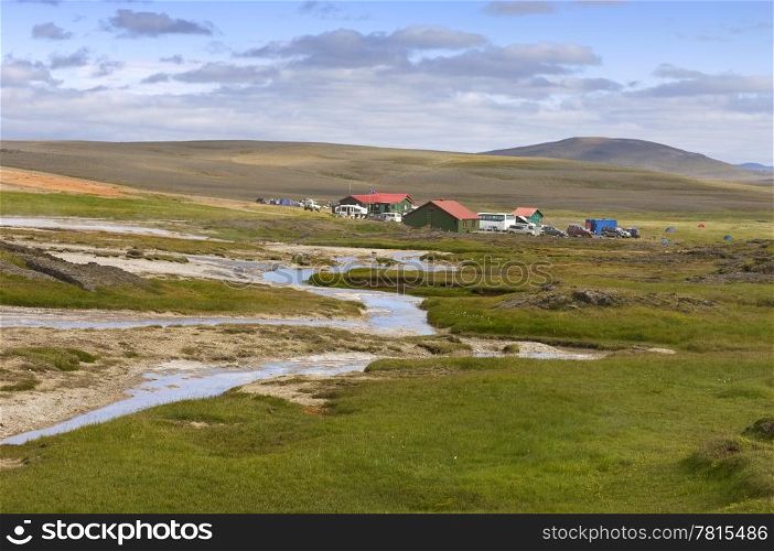 The base camp near the geothermal hot spring area in the remote highlands of the Kjolur region in Iceland.