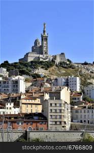 The Basilica of Notre Dame de la Garde known as the Good Mother for the old port of Marseille