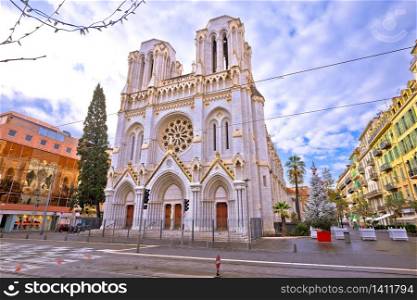 The Basilica of Notre-Dame de Nice and street of Nice view. Town in French riviera.