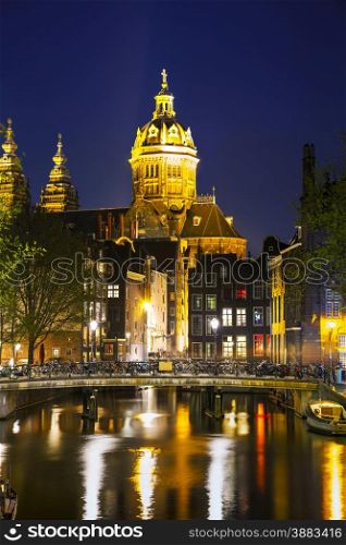 The Basilica of Saint Nicholas (Sint-Nicolaasbasiliek) in Amsterdam at sunset