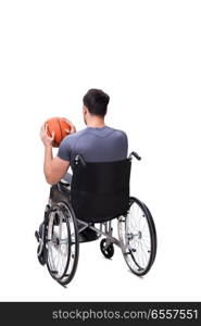 The basketball player recovering from injury on wheelchair. Basketball player recovering from injury on wheelchair