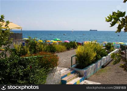 The beach with colorful umbrellas of Vietri sul mare, Amalfi coast, Salerno, Italy