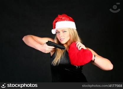 The beautiful blond girl in a santa hat