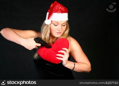 The beautiful blond girl in a santa hat