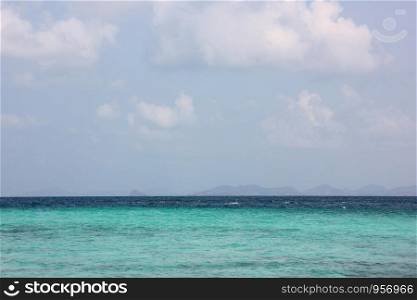 the beautiful blue sea with blue sky white cloud background at Chonburi Thailand