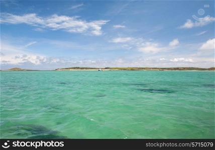 The beautiful emerald sea in summer at the Isles of Scilly, Cornwall, England.