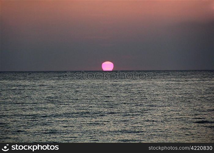 The beautiful evening sea with red sunset