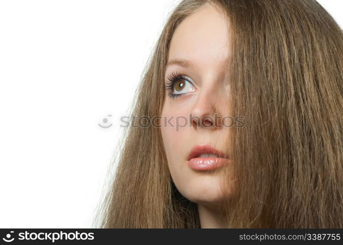 The beautiful girl with long healthy hair. It is isolated on a white background