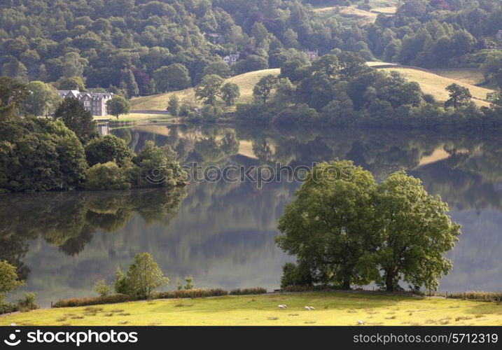 The beautiful reflective still waters at Grasmere, the Lake District, Cumbria, England.