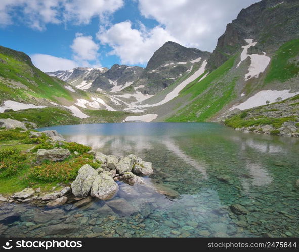 The beautiful summer landscape of Caucasus mountain. Dukka lakes near Arkhyz village in Russia. Daylight mountain landscape.