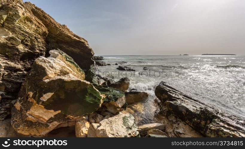 The beautiful waters of the Atlantic ocean with its rocky coastline near the City of Dakar in Senegal