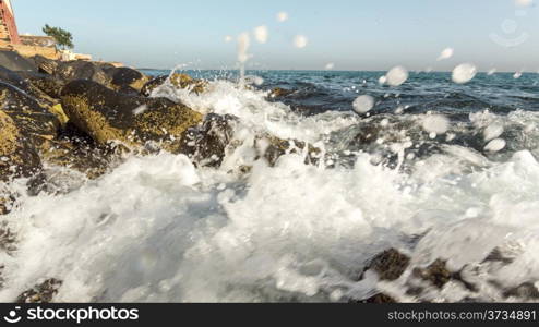 The beautiful waters of the Atlantic ocean with its rocky coastline near the City of Dakar in Senegal