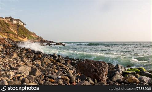 The beautiful waters of the Atlantic ocean with its rocky coastline near the City of Dakar in Senegal