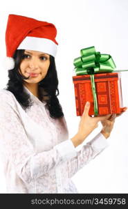 The beautiful young girl with gifts costs and the holiday smiles Christmas new year