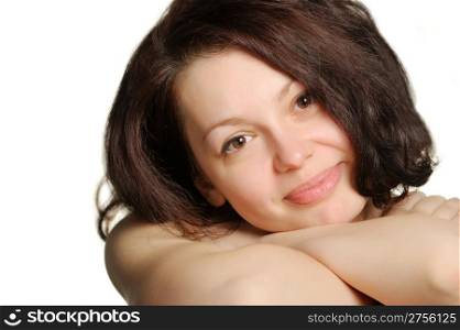 The beautiful young woman, head on hands. Natural beauty. It is isolated on a white background