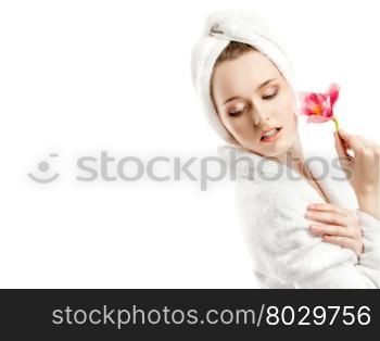 The Beautiful Young Woman in a White Bathrobe with Pink Orchid. Her Head is wrapped in a White Towel. Please, view my other pictures of this series below: