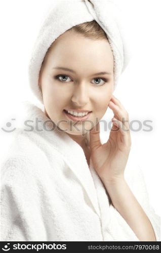 The Beautiful Young Woman in a White Terry Bathrobe. Her Head is wrapped in a White Towel
