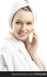 The Beautiful Young Woman in a White Terry Bathrobe. Her Head is wrapped in a White Towel