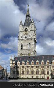 The Belfry in Ghent, Belgium. The 91m belfry of Ghent is one of three medieval towers that overlook the old city center of Ghent, the other two are Saint Bavo Cathedral and Saint Nicholas Church. UNESCO World Heritage Site. The tower dates from 1313.