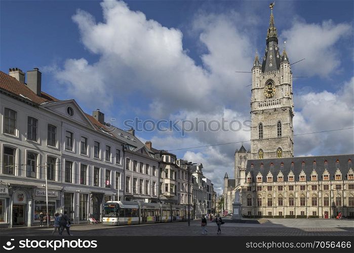 The Belfry in Ghent, Belgium. The 91m belfry of Ghent is one of three medieval towers that overlook the old city center of Ghent, the other two are Saint Bavo Cathedral and Saint Nicholas Church. UNESCO World Heritage Site. The tower dates from 1313.