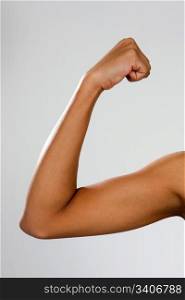 The biceps brachii muscle of a young, thin African-American woman.