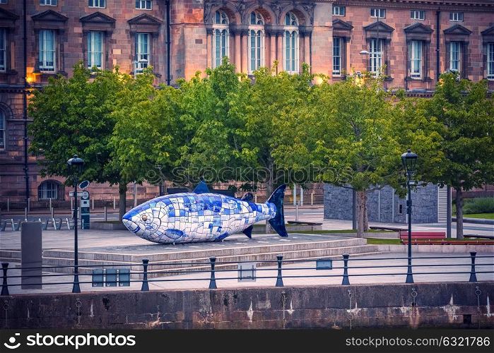The Big Fish sculpture in Belfast, Northern Ireland, UK. The Big Fish is a printed ceramic mosaic sculpture in Belfast also known as The Salmon of Knowledge. The work celebrates the regeneration of the Lagan River.