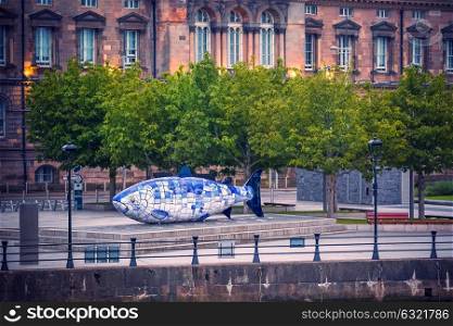 The Big Fish sculpture in Belfast, Northern Ireland, UK. The Big Fish is a printed ceramic mosaic sculpture in Belfast also known as The Salmon of Knowledge. The work celebrates the regeneration of the Lagan River.
