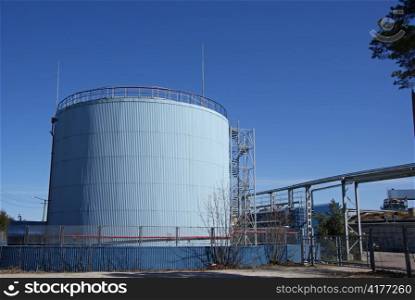 The big fuel tank on a background of the blue sky
